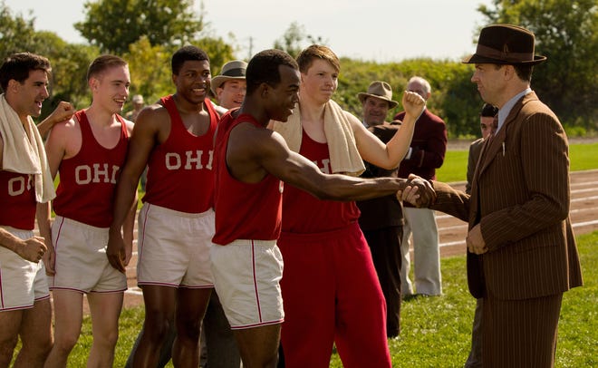 Stephan James, center, and Jason Sudeikis, right, star in "Race."