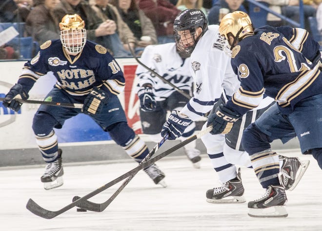 New Hampshire senior captain Collin MacDonald, center, hopes to return to the lineup this weekend after missing 16 games due to shoulder fractures. Mike Ross/UNH Chief Photographer