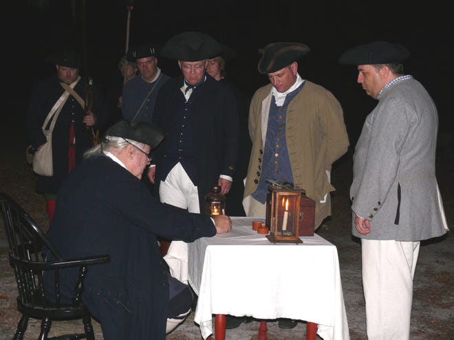 Costumed re-enactors participate in a ceremony marking Stamp Act protests. 2016 marks the 250th anniversary of such protests. Photo courtesy of Brunswick Town/Fort Anderson State Historic Site