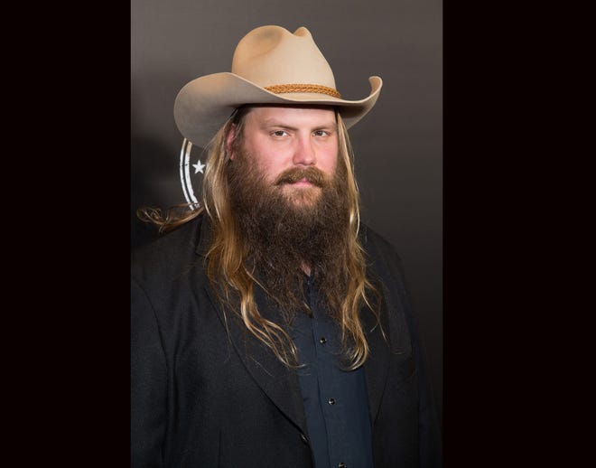 FILE - In this Dec. 5, 2015 file photo, Chris Stapleton attends the Imagine: John Lennon 75th Birthday Concert at Madison Square Garden in New York. Stapleton earned two extra nominations from the Academy of Country Music Awards, making him the leading nominee with seven nods. The ACM announced on Thursday the nominees for the song of the year and songwriter categories. Stapleton, who had five nominations in previously announced categories, added two more for his song “Nobody to Blame,” as co-writer and artist. (Photo by Charles Sykes/Invision/AP, File)