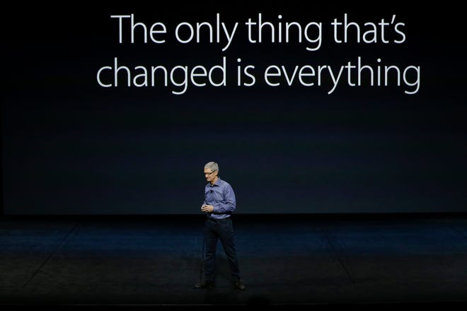 FILE - In this Wednesday, Sept. 9, 2015, file photo, Apple CEO Tim Cook discusses the new iPhone 6s and iPhone 6s Plus during the Apple event at the Bill Graham Civic Auditorium in San Francisco. Apple has spent years setting itself up as the champion of individual privacy and security, a decision that’s landed it in the government’s crosshairs over an iPhone allegedly used by one of the San Bernardino shooters. The high-profile case presents risks for Apple almost no matter what it does, and may spill over into the broader tech industry as well, potentially chilling cooperation with federal efforts to curb extremism. (AP Photo/Eric Risberg, File)