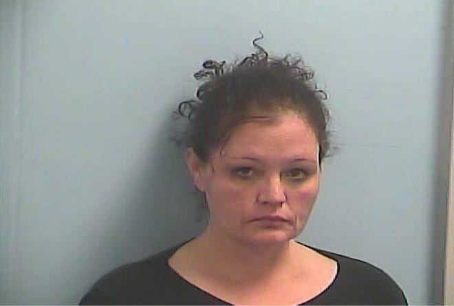 This photo provided by the Dawson County Sheriff's Office, shows Sonserea Dawn Evans, jailed Feb. 12 in Dawson County, Georgia, on charges of aggravated battery and drug possession. Dawson County sheriff's investigators say Evans used methamphetamine to spike the drink of a Waffle House co-worker, who was hospitalized in a comatose state and is still recovering nearly two months later. (Courtesy of the Dawson County Sheriff's Office via AP)