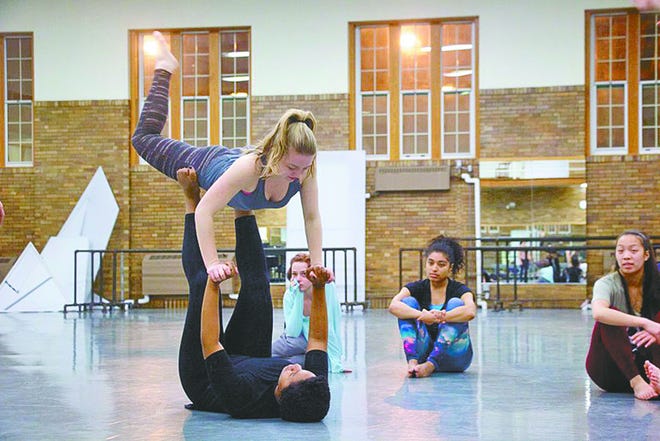 Members of the 2016 University of Iowa Dancers in Company troupe rehearse Feb. 11 for their upcoming “Water Works” program, which features six dances themed around water.