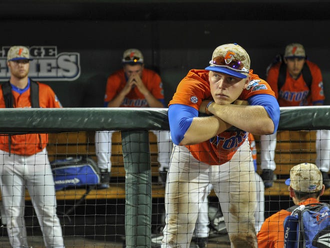 Florida catcher JJ Schwarz hit .332 with 18 homers (fourth in the nation) and 73 RBIs (third in the nation) as a freshman. He begins his sophomore season Friday night. (The Associated Press)
