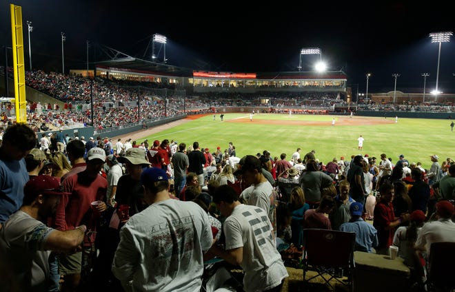 Students enjoy the right field pavilion during opening night at the new Sewell-Thomas Stadium on Friday as Alabama plays Maryland.
