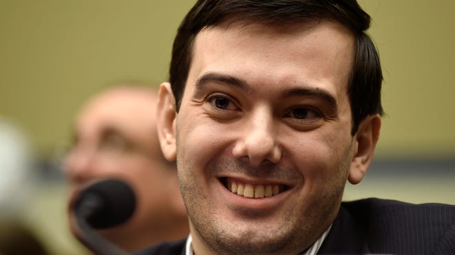 In this Feb. 4, 2016 file photo, Pharmaceutical chief Martin Shkreli smiles on Capitol Hill in Washington during the House Committee on Oversight and Reform Committee hearing on his former company's decision to raise the price of a lifesaving medicine. (AP Photo/Susan Walsh)