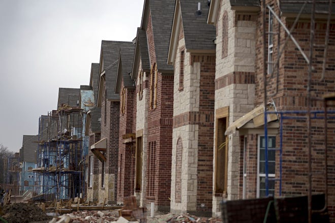 New homes under construction in Frisco, Texas, a suburban city about 15 miles north of Dallas. Millennials are showing an unexpected taste for suburbs. The Dallas Morning News/TNS/G.J. McCarthy