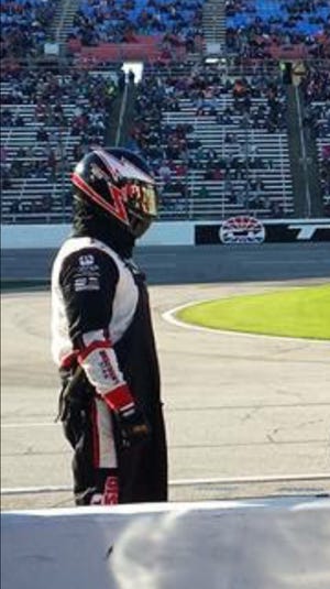 It's Andrew Lackey's job to stay attentive to what's happening on the track and being prepared for work in the pits as a gas man for the Penske Racing team during the Daytona 500.
