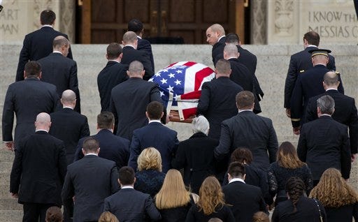 The casket containing the late Supreme Court Associate Justice Antonin Scalia, arrives for a funeral mass at the Basilica of the National Shrine of the Immaculate Conception in Washington, Saturday, Feb. 20, 2016. (AP Photo/Pablo Martinez Monsivais)