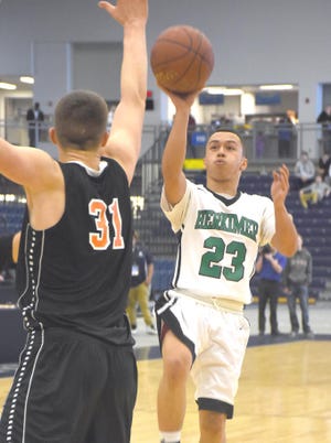 Michael Barreto (23) puts up a shot in the lane for Herkimer Saturday with Cooperstown’s Owen Kennedy defending at Onondaga Community College. 

Times Telegram Photo/Jon Rathbun