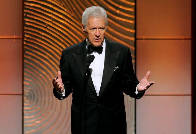 In this June 16, 2013 file photo, "Jeopardy!" game show host Alex Trebek appears at the 40th Annual Daytime Emmy Awards in Beverly Hills, Calif. The show said Canadians were precluded from taking last month's online test that is a pipeline for the show's contestants because of a change in that country's online privacy laws.