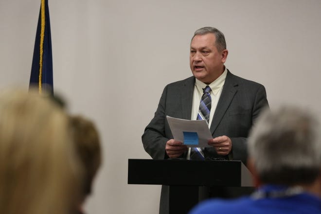 USD 428 superintendent Brad Reed reads a prepared statement about the incident involving the swim team Monday, Feb. 15, 2016 at the USD 428 building in Great Bend. The incident occurred Feb. 6 aboard a school bus bringing the Great Bend High School swim team back after a competition. There were claims that sexual assault by older team members on a freshman team member, Logan O'Neil, took place.