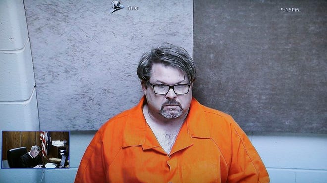 Jason Dalton, of Kalamazoo Township, Mich., is arraigned via video before Judge Christopher T. Haenicke, Monday, Feb. 22, 2016, in Kalamazoo, Mich. Dalton is charged with multiple counts of murder in a series of random shootings in western Michigan. (AP Photo/Carlos Osorio)