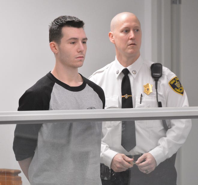 William McKeown of Framingham appears in Eastern Hampshire District Court in Belchertown, on Monday, charged with an armed assault during a drug deal in a University of Massachusetts-Amherst dormitory. Authorities say McKeown and another man who remains at large were let into the dorm Thursday for a marijuana deal. (Dave Roback/The Republican via AP)