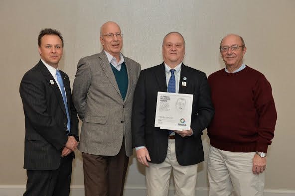 Pictured from left to right are: Matt Formica, president of NEWEA, Walter Kyllonen, vice chairman of the York Sewer District, Tim Haskell and Wayne McIntyre, clerk of the York Sewer District.

Courtesy photo