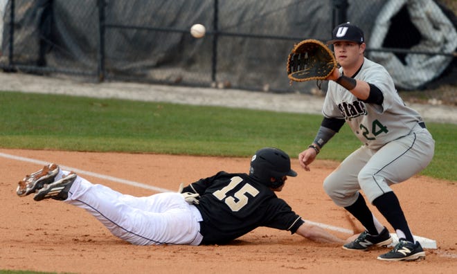 Wofford's Alec Paradowski (15) gets back to first base safely as USC Upstate's Zach Krider (24) waits for the ball during Wednesday's game at King Field. JOHN BYRUM/john.byrum@shj.com