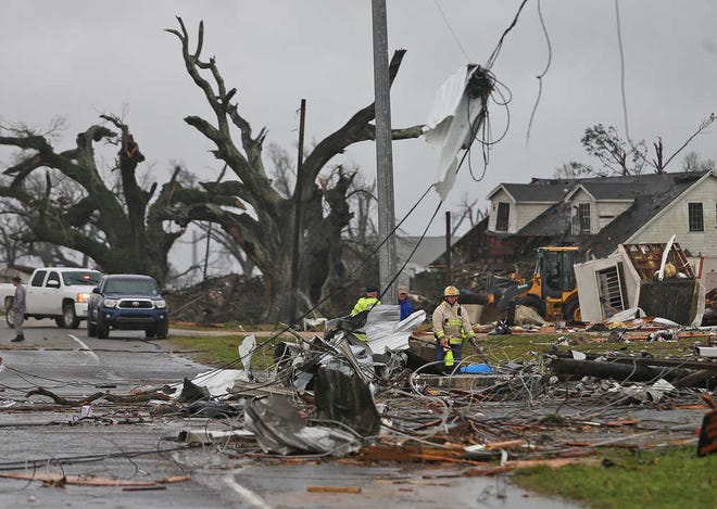 A house near the intersection of Routes 70 and 1 is seen after a powerful tornado struck Tuesday, Feb. 23, 2016, in Paincourtville, Louisiana.