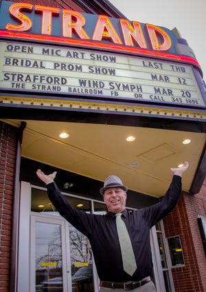 Dan Demers outside the former Strand Theater in Dover. Photo by Shawn St.Hilaire/Fosters.com