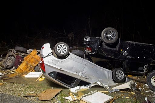 Destroyed trailers and vehicles are all that remain of the Sugar Hill RV Park after a suspected tornado hit in Convent, La., Tuesday, Feb. 23, 2016. Tornadoes and severe weather ripped through southern Louisiana and Mississippi on Tuesday. (AP Photo/Max Becherer)