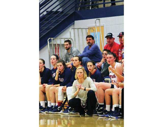Columbia Academy girls basketball coach is focused on the action on the court during the District 11-A Tournament at Culleoka. (Photo by correspondent Rob Fleming)