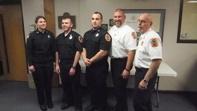 Hampton's three newest firefighters were sworn in at the Feb. 1 selectmen's meeting: (Left to right) Kourtney Auger, Ryan Pitts and Brian Alley, with Fire Chief Jameson Ayotte and Deputy Chief Bill Kennedy. Photo by Max Sullivan/Seacoastonline