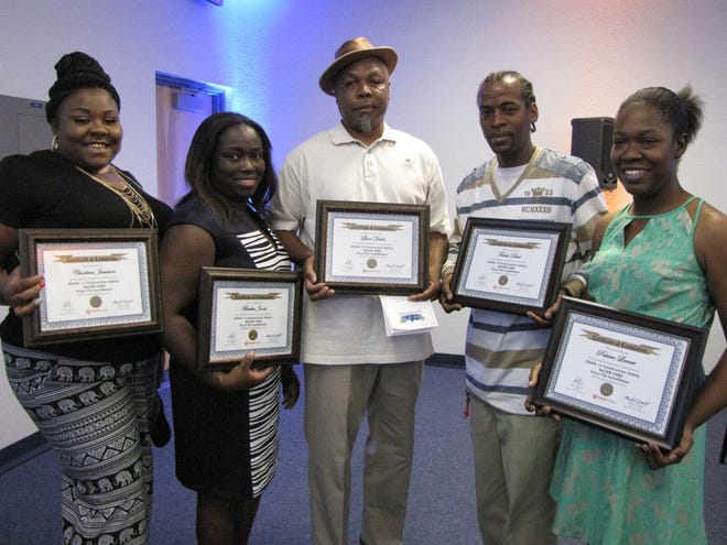 The Gainesville Housing Authority Job Training and Entrepreneurial Program grads are Charlene Jamison, from left, Bertha Jones, Leon Davis, Travis Durr and Patrice Lanier. Not pictured is Mindy Ransom.