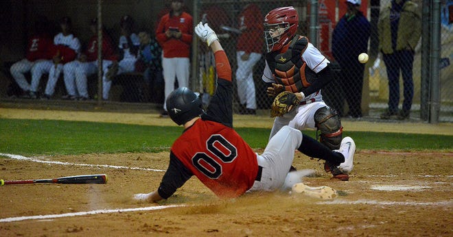 South Sumter's Chris Sumner (00) slides past Tavares' Tucker Horsley (4) as he gains a run for his team at a game at Fred Stover Sports Complex on Friday in Tavares.