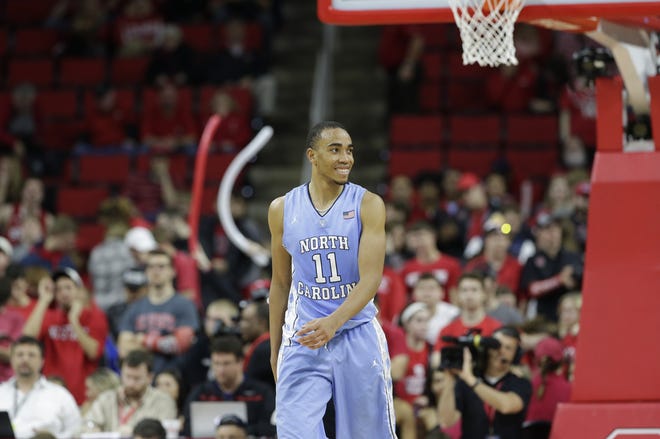 North Carolina's Brice Johnson will be all smiles if his Tar Heels wind up in Raleigh's PNC Arena for their first two games in the NCAA tournament. (AP Photo/Gerry Broome)