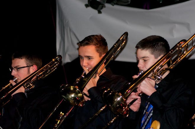 Trevor Cirillo (trombone), Jack Armstrong (trombone) and Stephen Landry (trombone) played Jan. 30 at The Met in the "Rock 4 Kids!" benefit. Photo: Hasbro / Aaron Arvia
