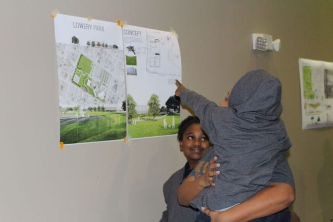 Donaldsonville community members attended the meeting to see the 15 designs.