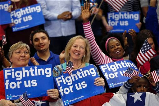 Supporters of Democratic presidential candidate Hillary Clinton cheer at her election night watch party after winning the South Carolina Democratic primary in Columbia, S.C. on Saturday. (AP Photo/Gerald Herbert)