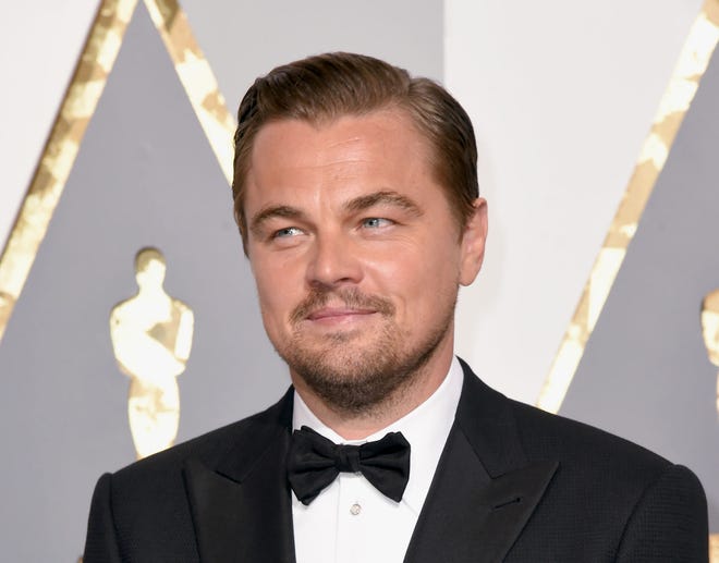 Leonardo DiCaprio arrives at the Oscars on Sunday, Feb. 28, 2016, at the Dolby Theatre in Los Angeles.
