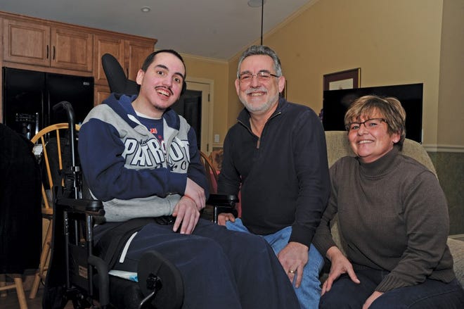 Jordan St. Gelais with his father, Moe St. Gelais, and stepmother, Jean St. Gelais. Jordan suffers from Batten disease, a rare inherited genetic disorder that causes progressive neurological impairment and early death.