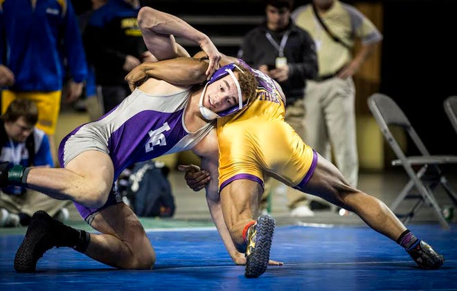 Tyree Overton's final bout Saturday against Sadarriss Patterson, of Ellsworth Community College. In a back-and-forth match Overton earned an 8th place finish at the National Tournament in Council Bluffs, Iowa. Photo courtesy of Lincoln College Sports Information
