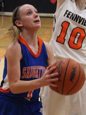 Saugatuck's Maddie Stewart hit three free throws in double overtime to secure a district semifinal victory. Dan D'Addona/Sentinel staff