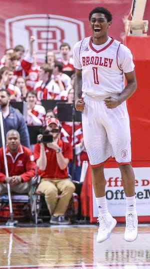 Bradley's Donte Thomas (1) celebrates after sinking a three pointer to take the game to a 71-68 Braves lead with under 20 seconds left in their game at Carver Arena in Peoria on Saturday, February 20, 2016. The Bradley Braves men's basketball team defeated the Drake Bulldogs, 73-70.