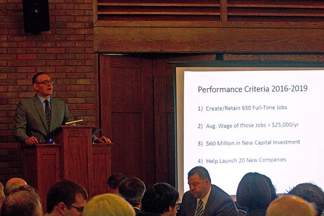 Knox County Area Partnership for Economic Development President Ken Springer outlines performance criteria for the next four years while unveiling a strategic plan Thursday morning in Knox College's Lincoln Room. The partnership laid out its plans to boost jobs, wages and investments in the area. LEWIS MARIEN/The Register-Mail