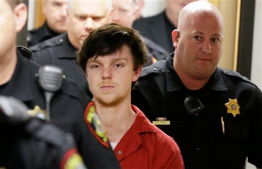 Ethan Couch is led by sheriff deputies after a juvenile court for a hearing Friday, Feb. 19, 2016, in Fort Worth.
