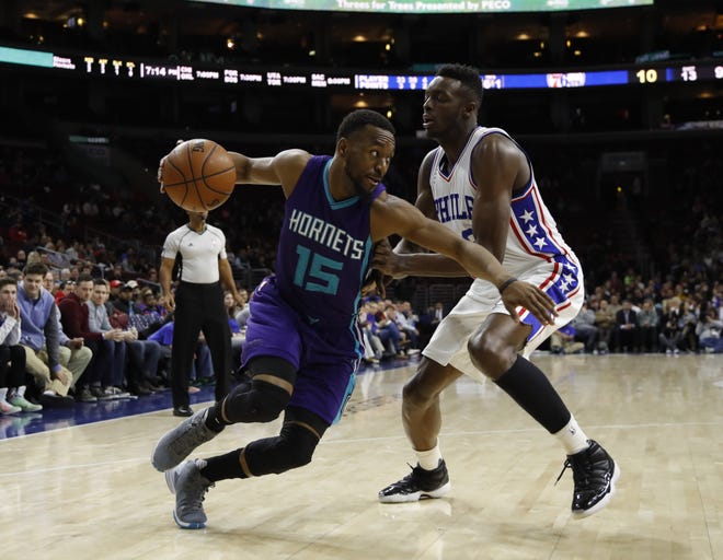 The Hornets' Kemba Walker makes for the basket in Wednesday's game against the 76ers in Philadelphia. Hornets coach Steve Clifford said Walker's improved play has been a factor in the team's recent success. AP Photo/Matt Slocum