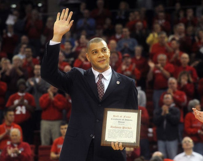 Former Bradley and NBA player Anthony Parker waves to the crowd after receiving his plaque commemorating his induction into the Bradley Hall of Fame during the halftime of a game in 2012 at Carver Arena.