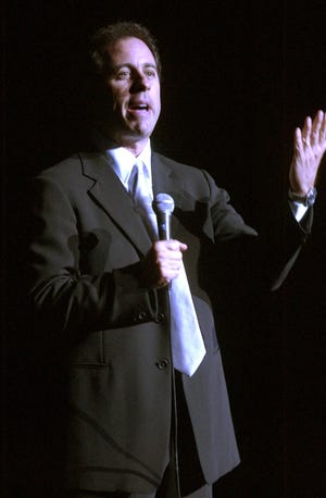 Comedian Jerry Seinfeld perfroms Sept. 18, 2004, at the grand reopening of the Bob Hope Theater in downtown Stockton. CLIFFORD OTO/RECORD FILE 2004