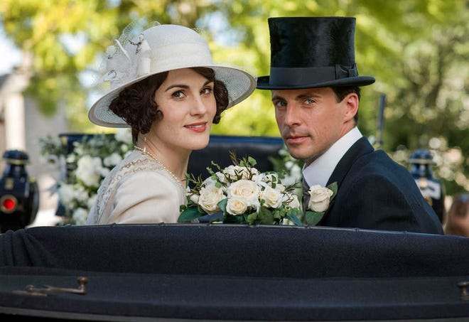 This image released by PBS shows Michelle Dockery as Lady Mary, left, and Matthew Goode as Henry Talbot in a scene from the final season of "Downton Abbey." The series finale airs in the U.S. on Sunday. (Nick Briggs/Carnival Film & Television Limited 2015 for MASTERPIECE via AP)