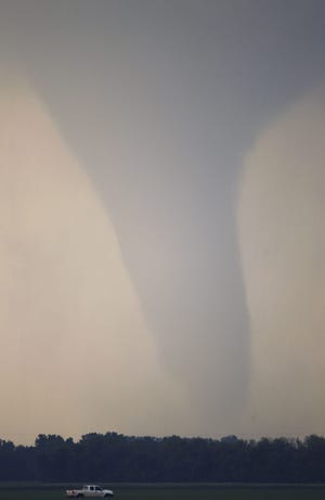 A tornado moves on the ground in 2012 near I-70 north of Solomon, Kan.