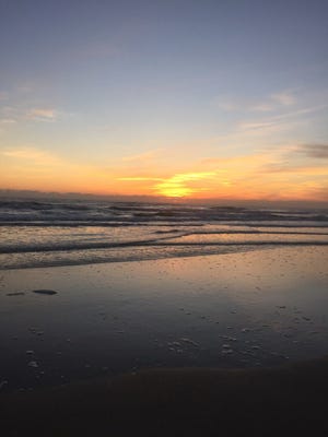 The sun rises Saturday over Ormond Beach. NEWS-JOURNAL/JIM HAUG