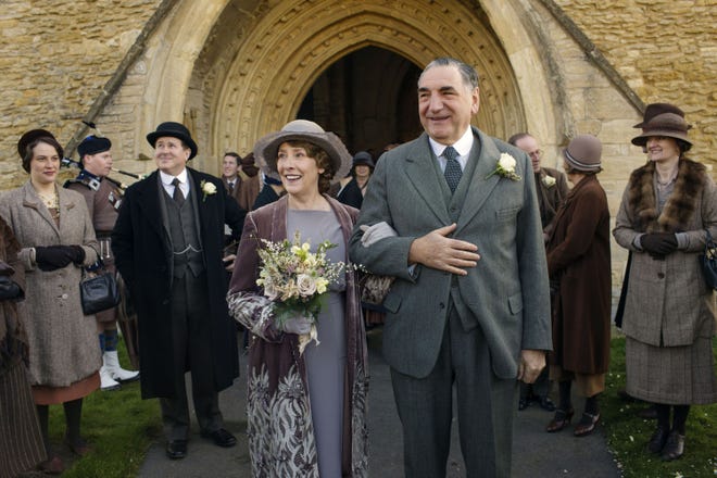 The wedding of Phyllis Logan's Mrs. Hughes, center left, and Jim Carter's Mr. Carson was a highlight of the final season of PBS' "Downton Abbey," which ends tonight. NICK BRIGGS/CARNIVAL FILM & TELEVISION LIMITED 2015 FOR MASTERPIECE