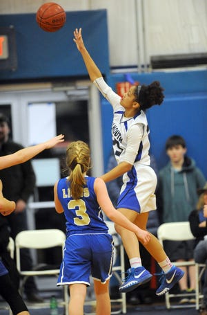 Kendall Currence of Falmouth Academy loops a shot against St. John Paul II in the Mariners' tournament win Friday night. Currence scored 22 points as a freshman in last year's South semifinal against Greater New Bedford Voke. Ron Schloerb/Cape Cod Times