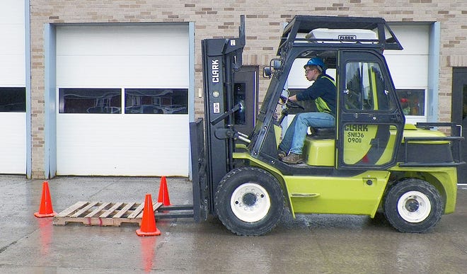 Herkimer-Fulton-Hamilton-Otsego BOCES heavy equipment operation student Jacob Randall, of Dolgeville, operates a forklift through an obstacle course during his forklift certification performance test on Feb. 29 at Herkimer BOCES. SUBMITTED PHOTO