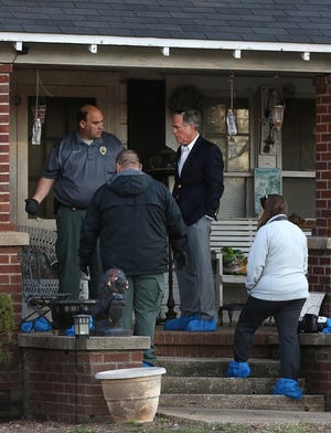 Three people were found dead at a home on Alexis-Lucia Road Monday evening and investigators along with District Attorney Locke Bell (dark jacket) were on the scene early Tuesday morning, March 1, 2016. MIKE HENSDIILL/THE GAZETTE