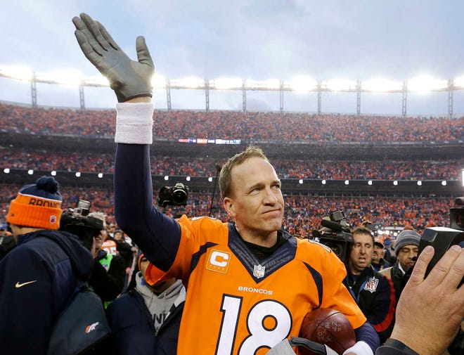 Denver Broncos quarterback Peyton Manning waves to spectators following the AFC Championship game between the Denver Broncos and the New England Patriots on Jan. 24 in Denver. (AP Photo/Chris Carlson)