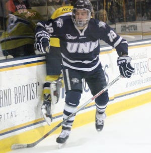 Sophomore forward Andrew Poturalski and the UNH hockey team finished a disappointing season Sunday night in the first round of the Hockey East playoffs. Al Pike/Foster's Daily Democrat